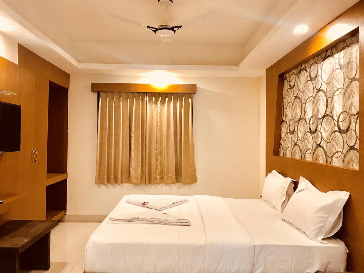 Hotel Grand Suites Bangalore Bagian luar foto