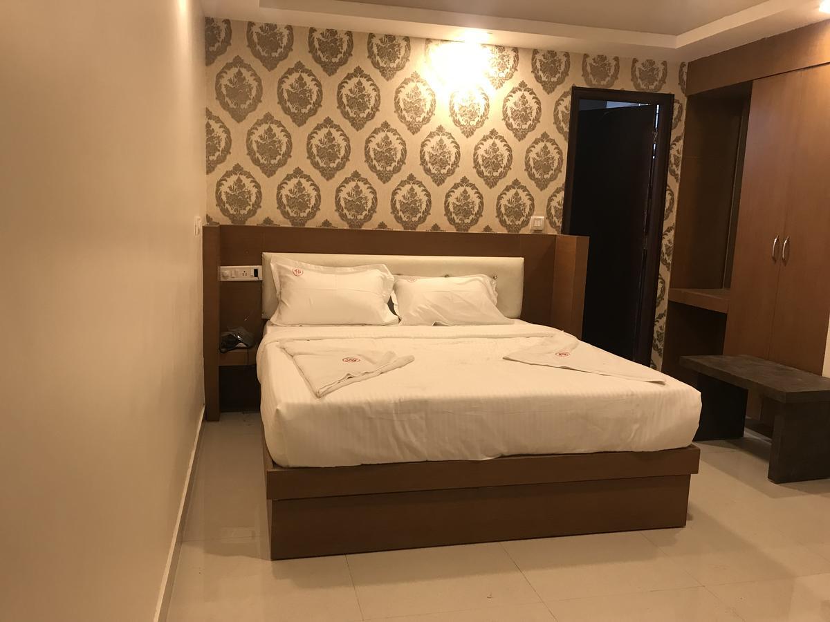 Hotel Grand Suites Bangalore Bagian luar foto