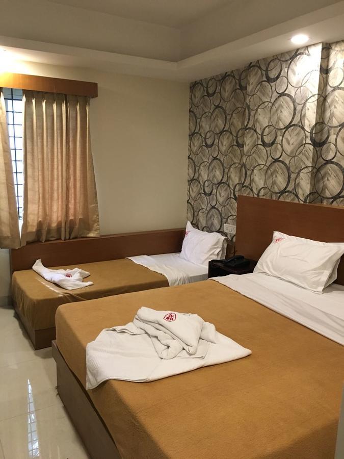 Hotel Grand Suites Bangalore Bagian luar foto